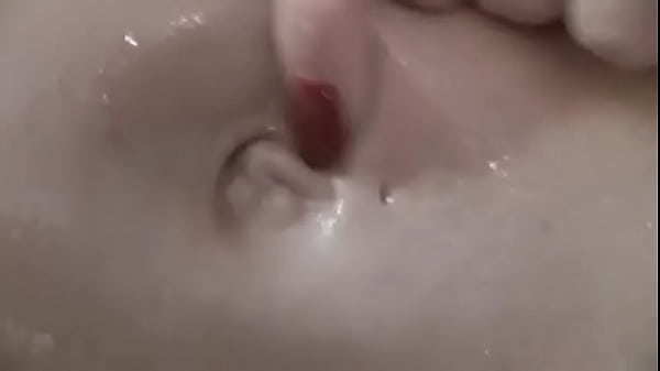 sexy girl doing some hot belly play with oil